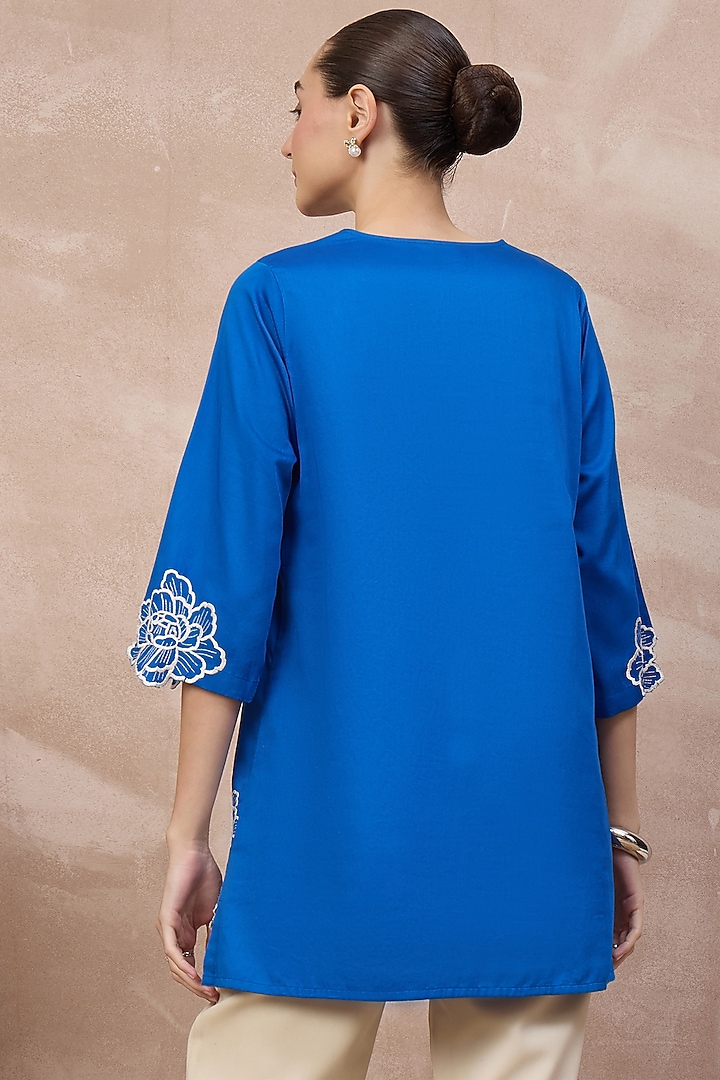 Blue Cotton Satin Cutwork Embroidered Top by First Resort by Ramola Bachchan at Pernia's Pop Up Shop