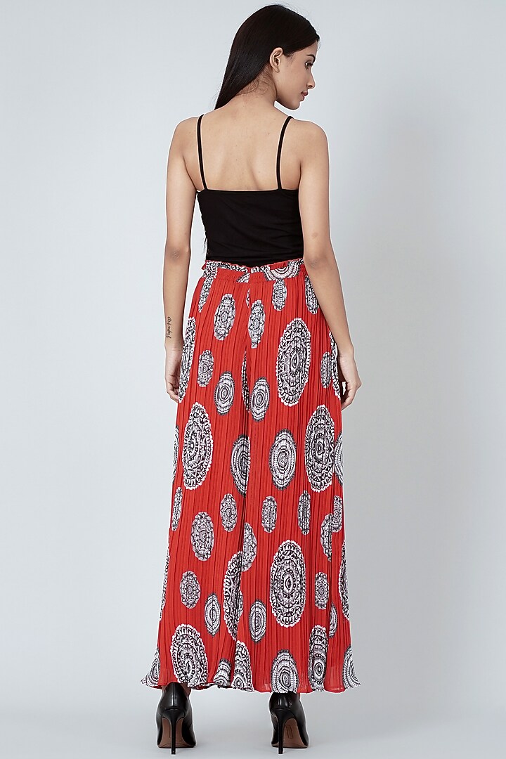 Red Geometric Printed Pleated Palazzo Pants by First Resort by Ramola Bachchan at Pernia's Pop Up Shop