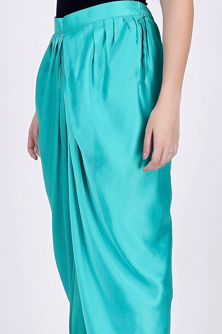 Cyan Nylon Satin Tulip Pants by First Resort by Ramola Bachchan at Pernia's Pop Up Shop
