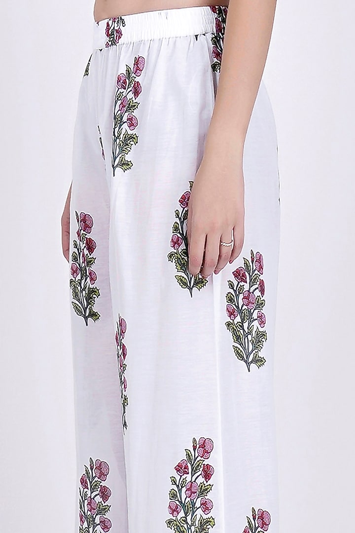 White Floral Printed Pants by First Resort by Ramola Bachchan at Pernia's Pop Up Shop