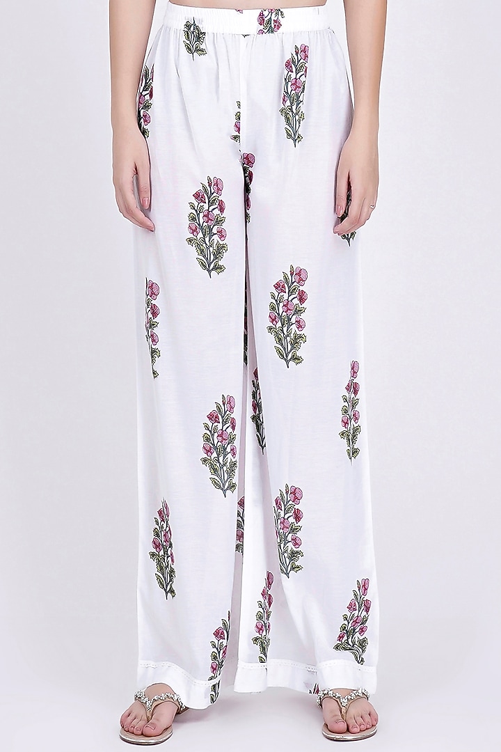 White Floral Printed Pants by First Resort by Ramola Bachchan at Pernia's Pop Up Shop