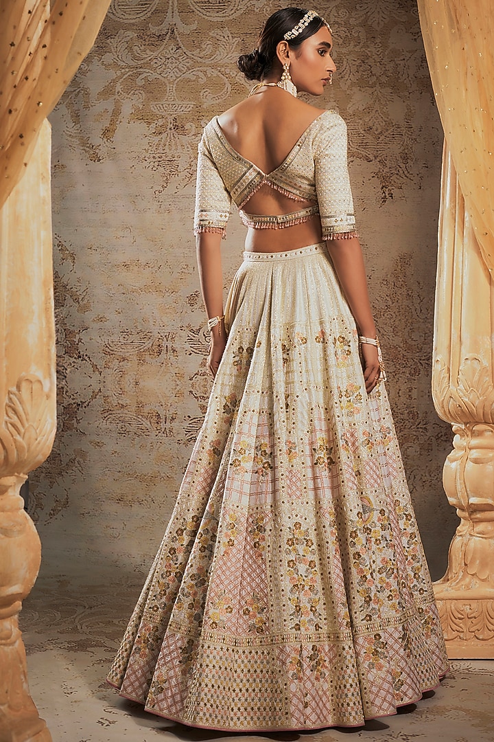 Ivory Tulle Bridal Bridal Lehenga Set by Falguni Shane Peacock at Pernia's Pop Up Shop