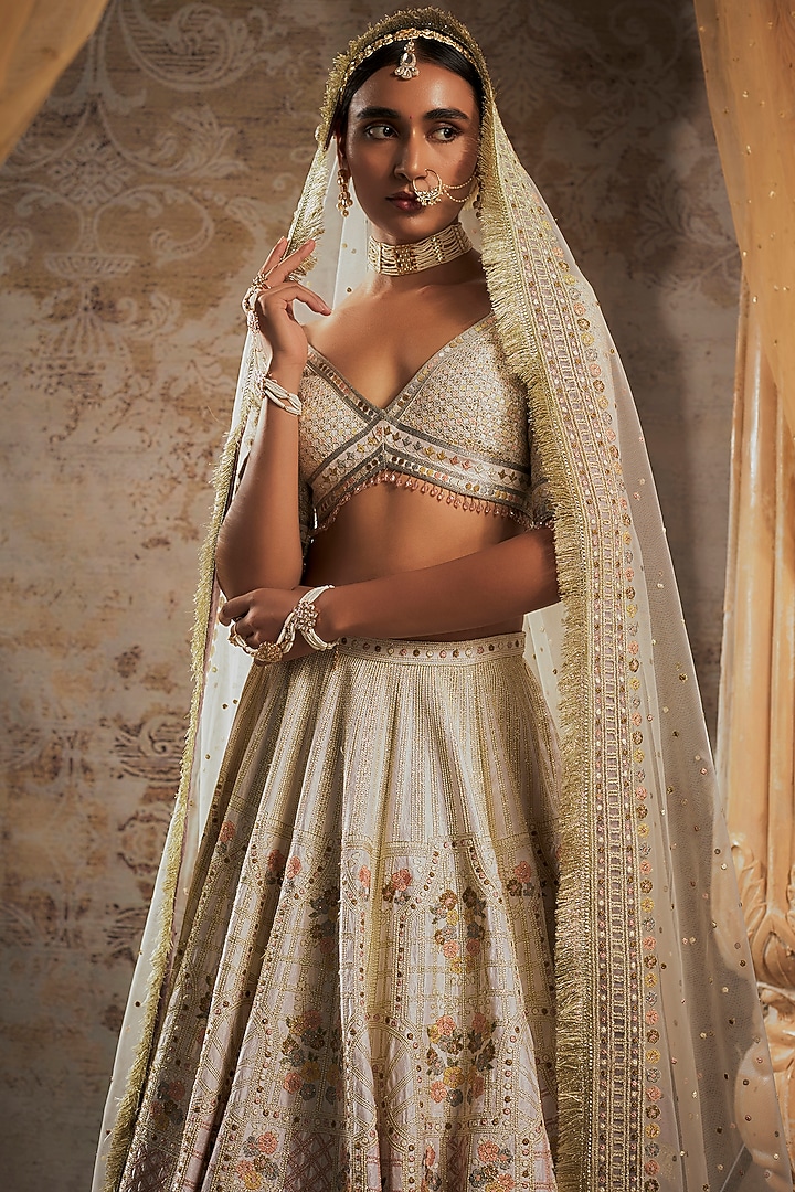 Ivory Tulle Bridal Bridal Lehenga Set by Falguni Shane Peacock at Pernia's Pop Up Shop
