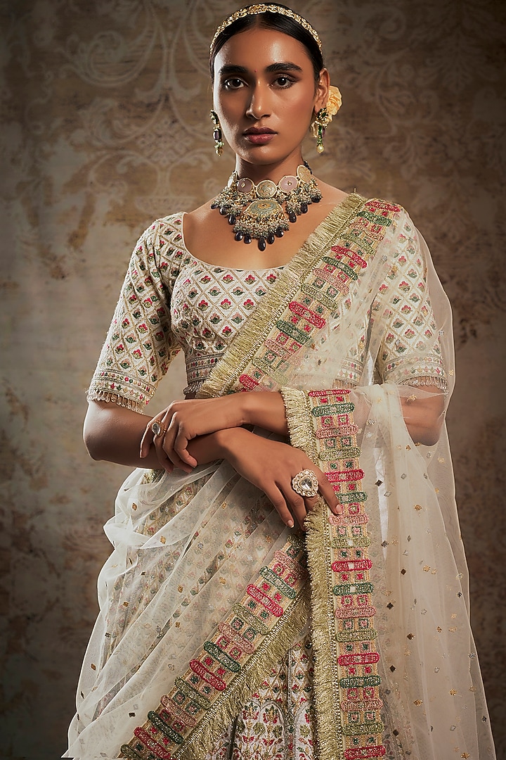 Ivory Tulle Bridal Bridal Lehenga Set by Falguni Shane Peacock at Pernia's Pop Up Shop
