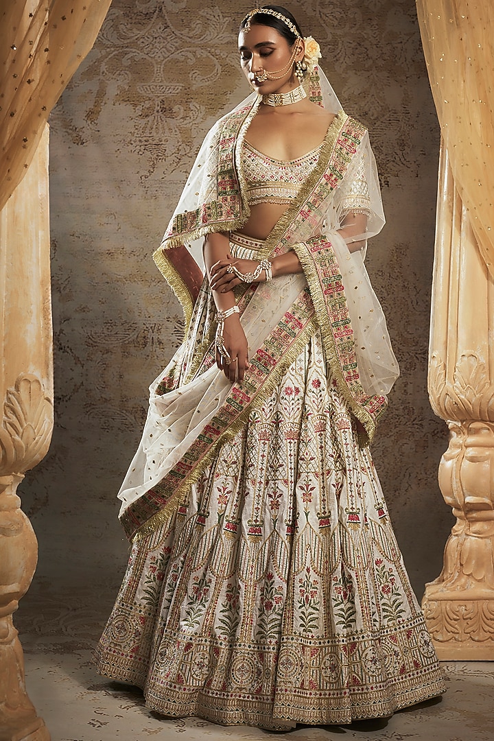 Ivory Tulle Bridal Bridal Lehenga Set by Falguni Shane Peacock at Pernia's Pop Up Shop
