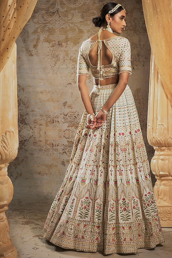 Ivory Tulle Bridal Bridal Lehenga Set by Falguni Shane Peacock at Pernia's Pop Up Shop