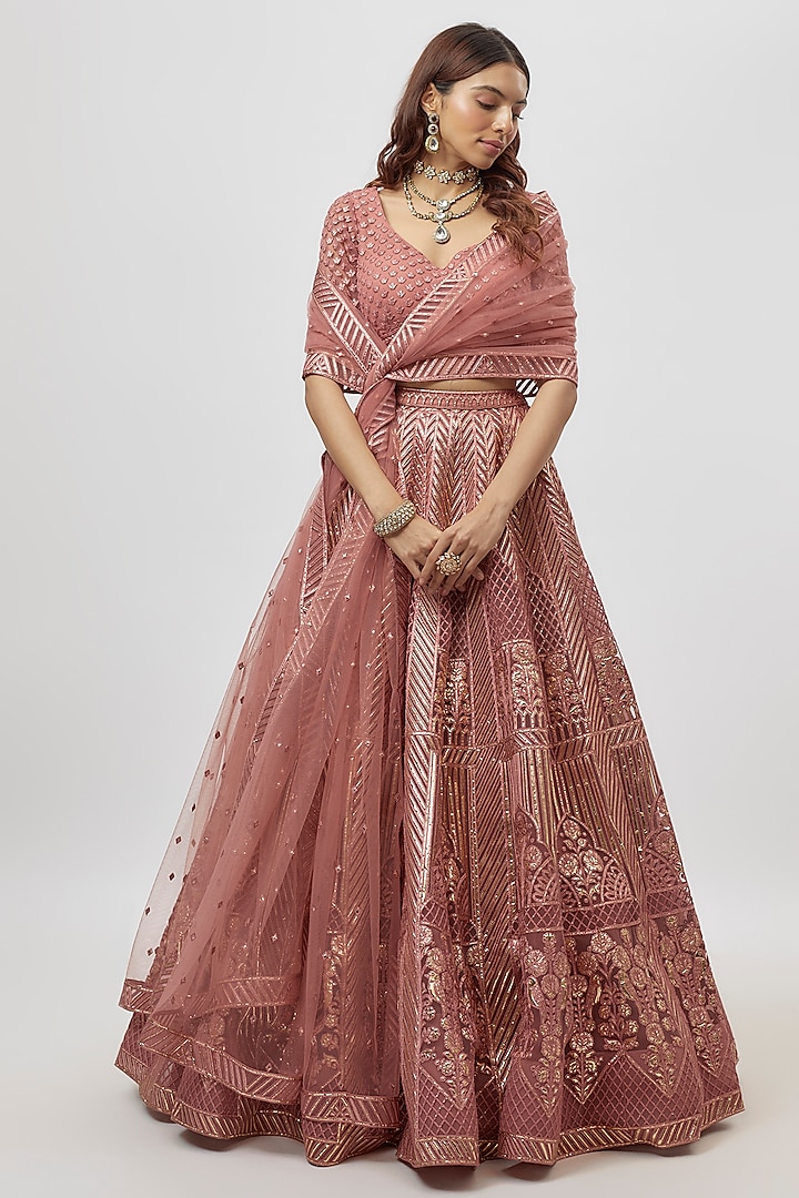 Dark Rose Pink Net Bridal Lehenga Set by Falguni Shane Peacock India at Pernia's Pop Up Shop