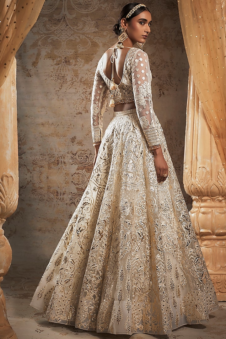 Ivory Tulle Bridal Lehenga Set Design by Falguni Shane Peacock at