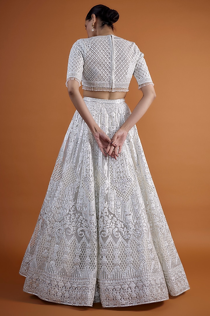 Ivory Tulle Embroidered Bridal Lehenga Set by Falguni Shane Peacock at Pernia's Pop Up Shop