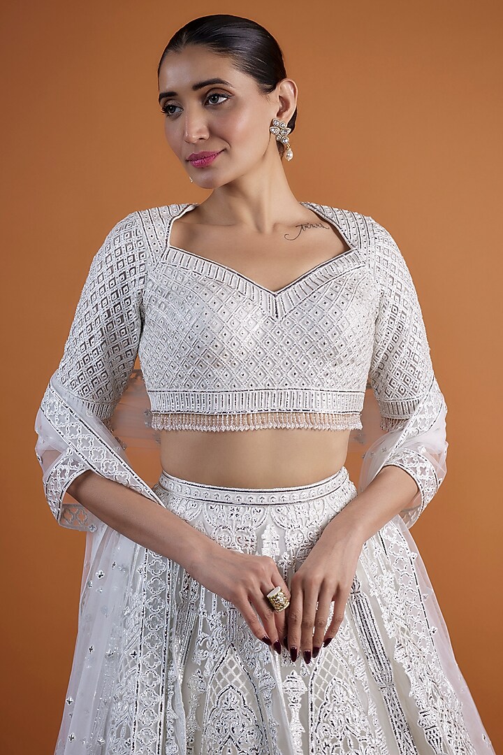 Ivory Tulle Embroidered Bridal Lehenga Set by Falguni Shane Peacock at Pernia's Pop Up Shop