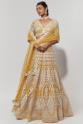 Yellow Net Foil Bridal Lehenga Set by Falguni Shane Peacock