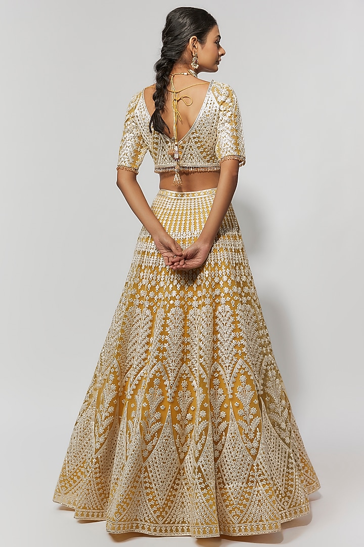 Yellow Net Foil Bridal Bridal Lehenga Set by Falguni Shane Peacock at Pernia's Pop Up Shop