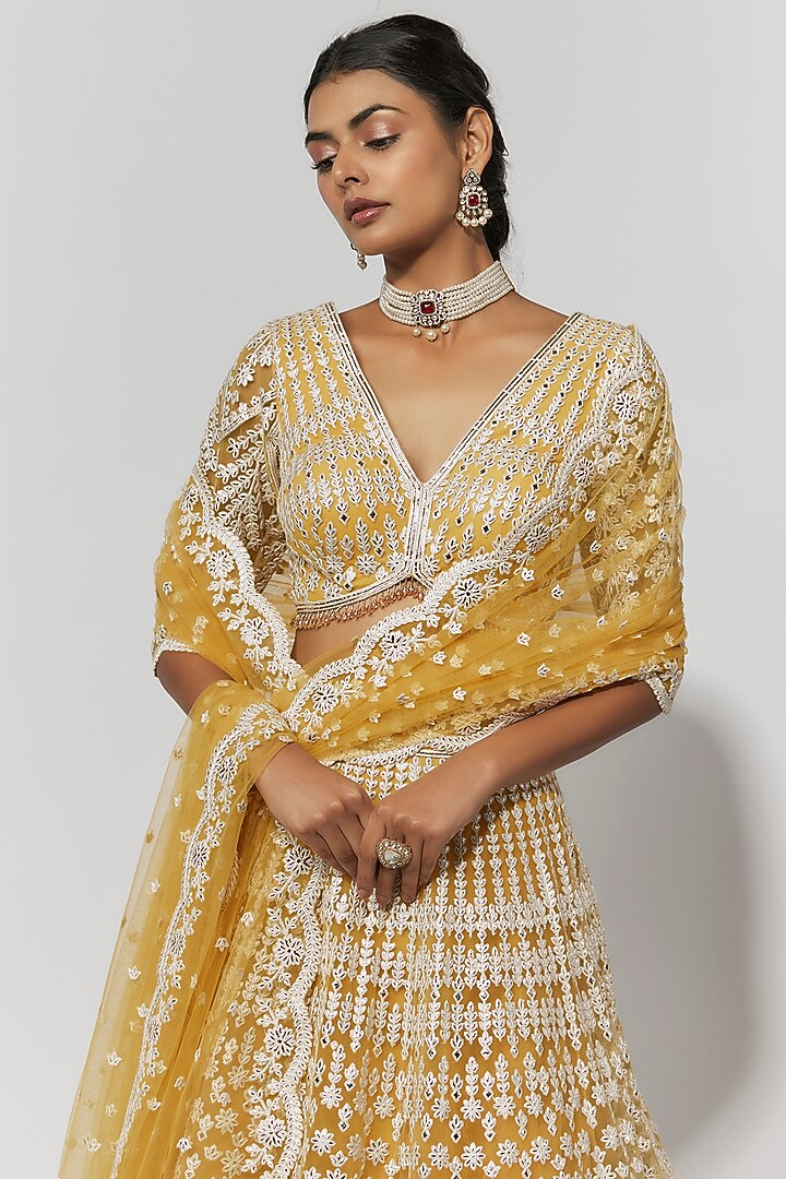 Yellow Net Foil Bridal Bridal Lehenga Set by Falguni Shane Peacock at Pernia's Pop Up Shop