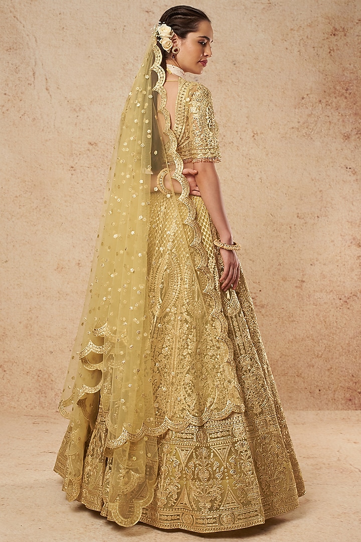 Mustard Tulle Bridal Lehenga Set With Foil Work by Falguni Shane Peacock India at Pernia's Pop Up Shop