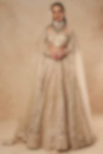 Beige Tulle Foil Bridal Lehenga Set by Falguni Shane Peacock India at Pernia's Pop Up Shop