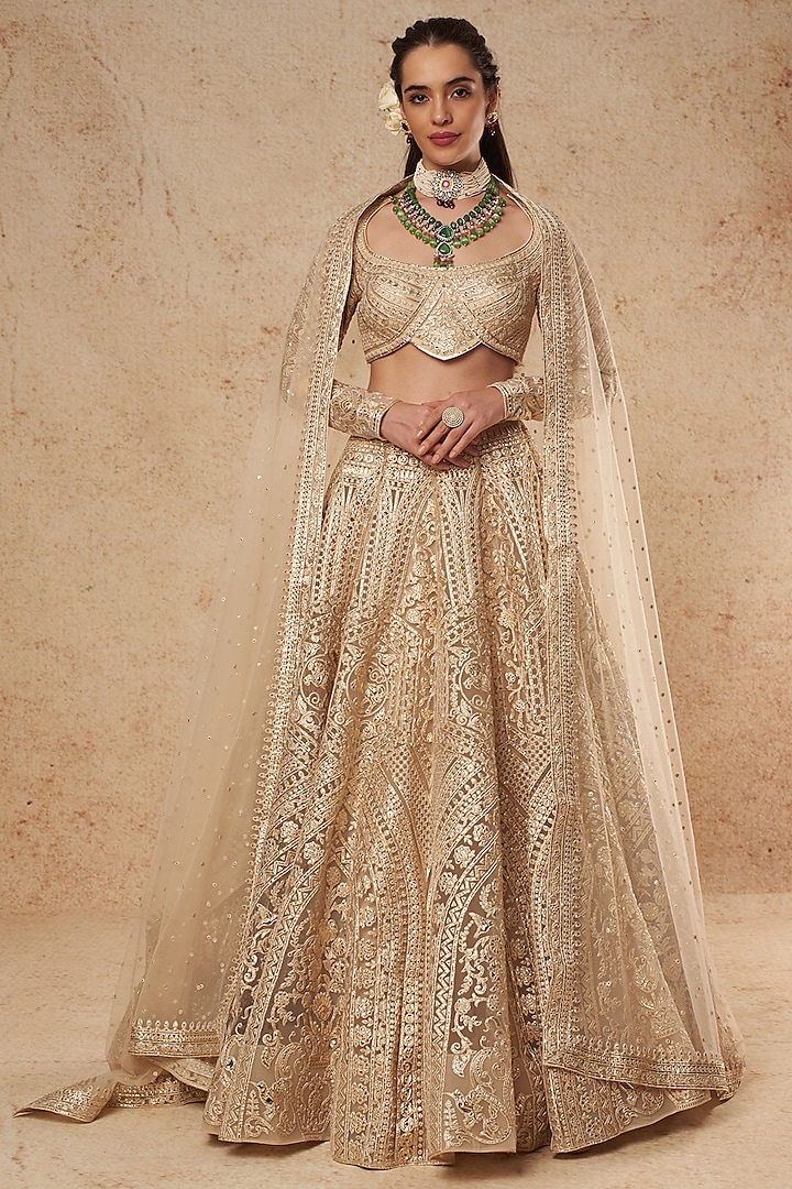 Beige Tulle Foil Bridal Lehenga Set by Falguni Shane Peacock India at Pernia's Pop Up Shop