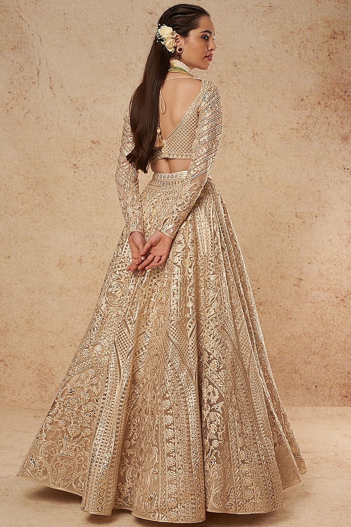 Beige Tulle Foil Bridal Lehenga Set by Falguni Shane Peacock India at Pernia's Pop Up Shop
