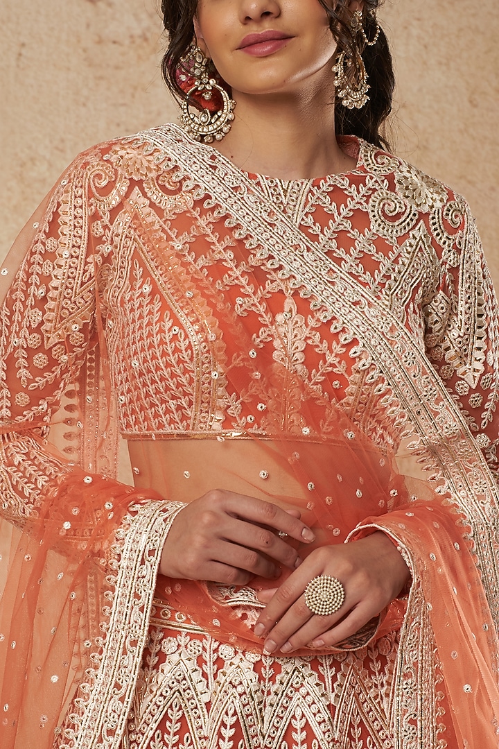 Burnt Orange Tulle Bridal Lehenga Set With Foil Work by Falguni Shane Peacock India at Pernia's Pop Up Shop