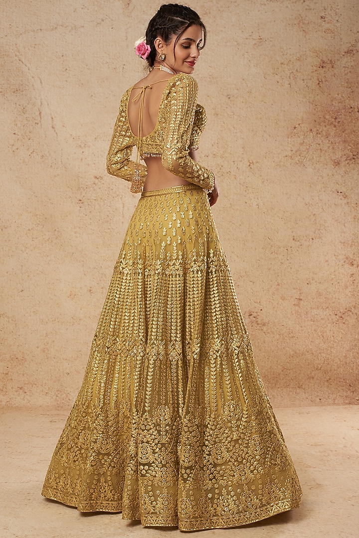 Mustard Tulle Bridal Lehenga Set With Foil Work by Falguni Shane Peacock India at Pernia's Pop Up Shop