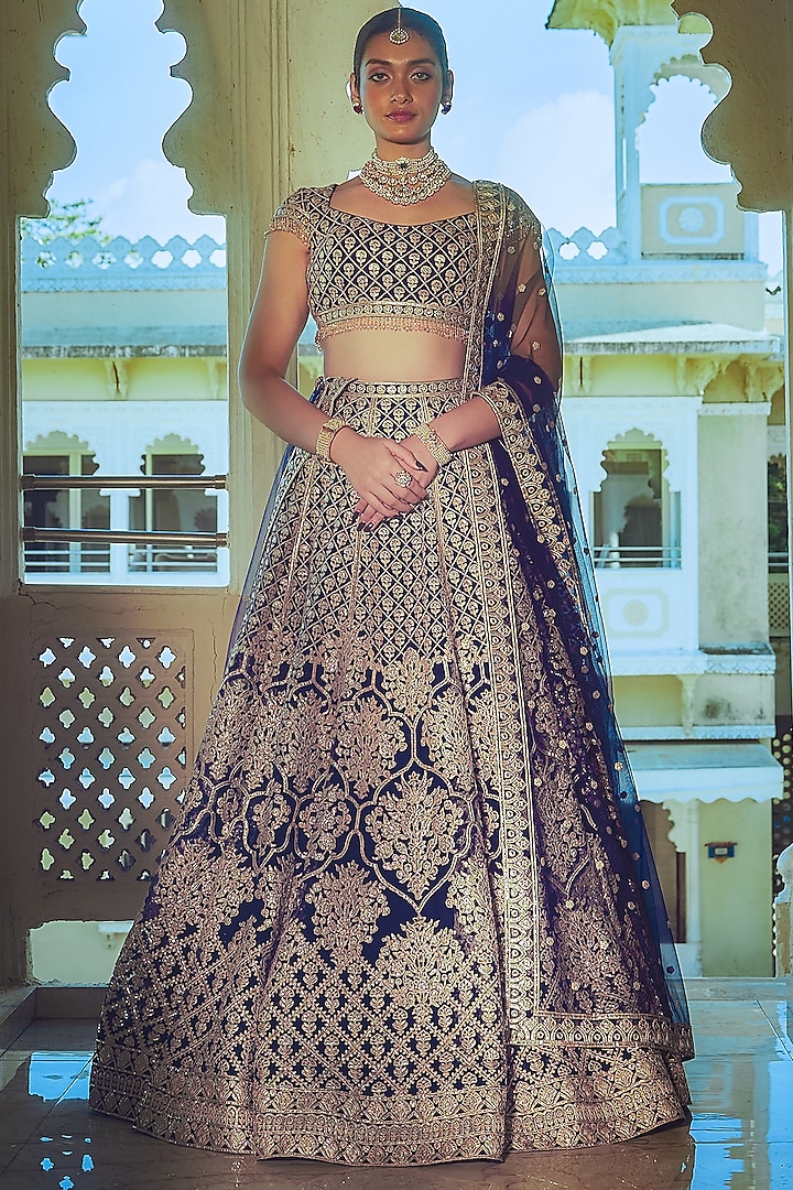 Royal Blue Net Gold Foil Printed & Embroidered Bridal Lehenga Set by Falguni Shane Peacock at Pernia's Pop Up Shop