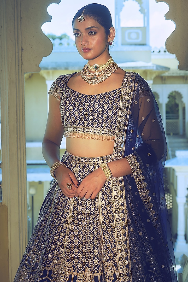 Royal Blue Net Gold Foil Printed & Embroidered Bridal Lehenga Set by Falguni Shane Peacock at Pernia's Pop Up Shop