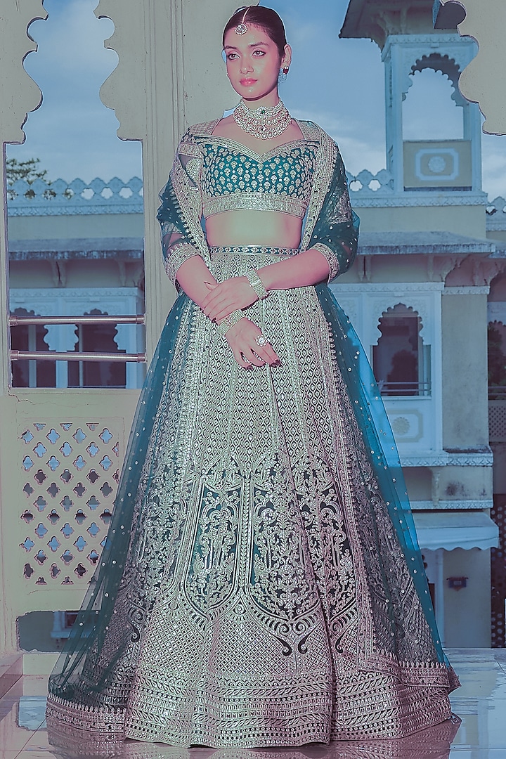 Teal Blue Net Gold Foil Printed & Embroidered Bridal Lehenga Set by Falguni Shane Peacock at Pernia's Pop Up Shop