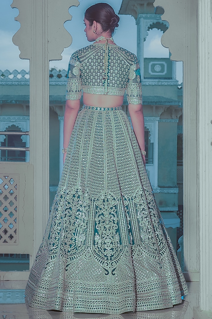 Teal Blue Net Gold Foil Printed & Embroidered Bridal Lehenga Set by Falguni Shane Peacock at Pernia's Pop Up Shop