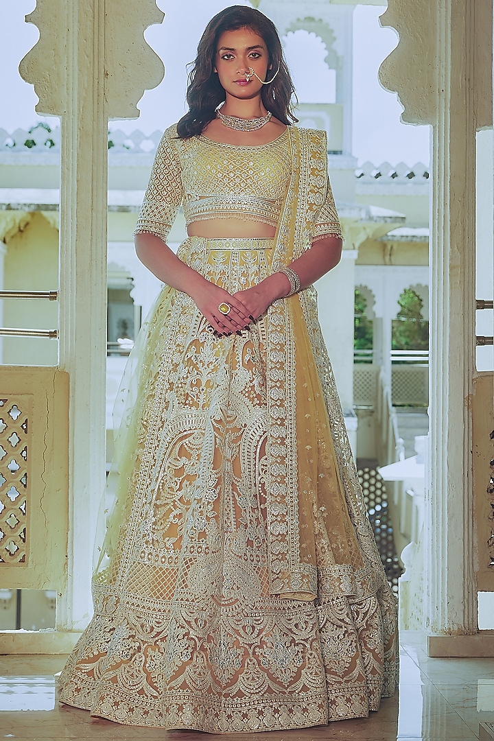 Yellow Net Silver Foil Printed & Embroidered Bridal Lehenga Set by Falguni Shane Peacock at Pernia's Pop Up Shop