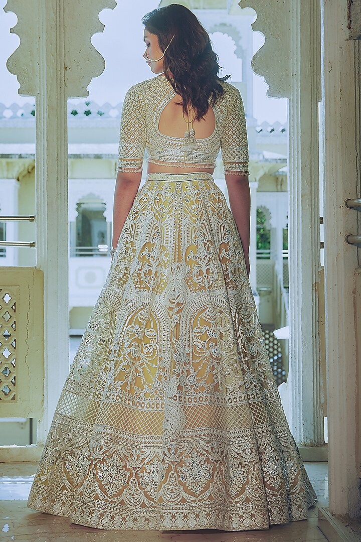 Yellow Net Silver Foil Printed & Embroidered Bridal Lehenga Set by Falguni Shane Peacock at Pernia's Pop Up Shop