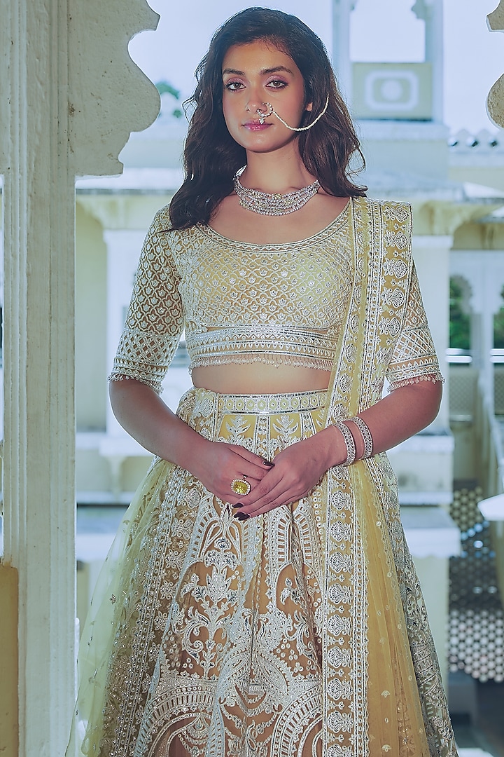 Yellow Net Silver Foil Printed & Embroidered Bridal Lehenga Set by Falguni Shane Peacock at Pernia's Pop Up Shop