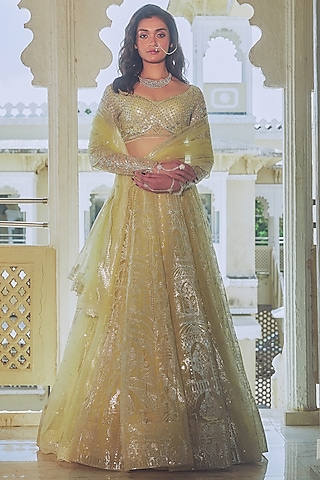 Yellow Net Silver Foil Printed & Embroidered Lehenga Set by Falguni Shane Peacock