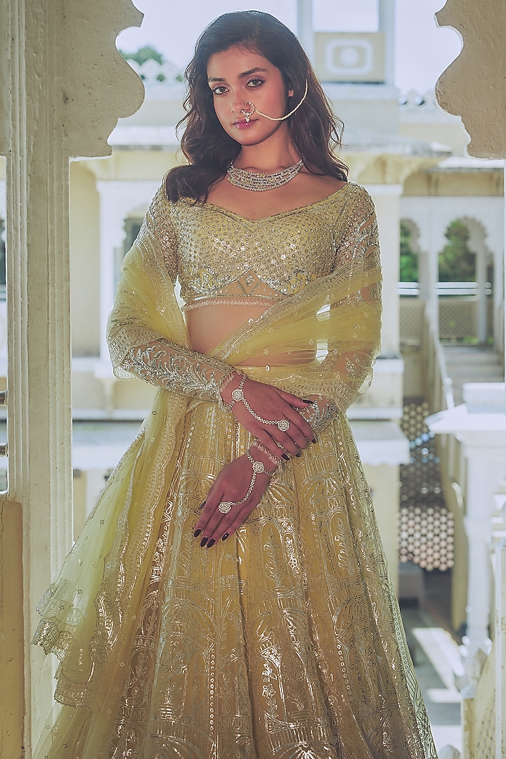 Yellow Net Silver Foil Printed & Embroidered Bridal Lehenga Set by Falguni Shane Peacock at Pernia's Pop Up Shop