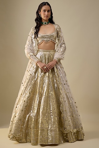Ivory Net Gold Foil Printed & Embroidered Lehenga Set by Falguni Shane Peacock India