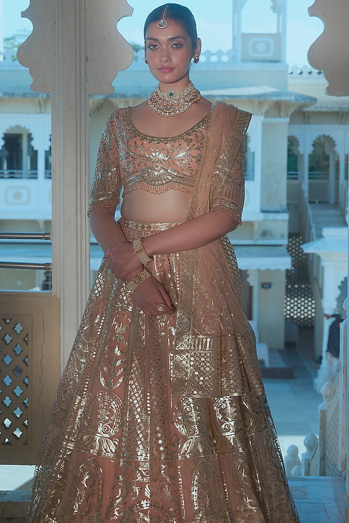 Peach Net Gold Foil Printed & Embroidered Bridal Lehenga Set by Falguni Shane Peacock at Pernia's Pop Up Shop