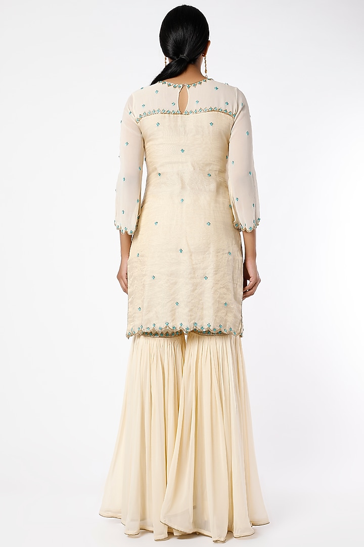 Champagne Ivory Chanderi Tissue & Georgette Gharara Set by Farha Syed at Pernia's Pop Up Shop