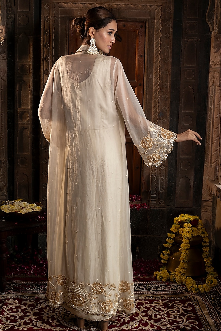 Ivory & Golden Satin Silk Cutdana Hand Embroidered Draped Gown With Jacket  by Farha Syed at Pernia's Pop Up Shop 2026