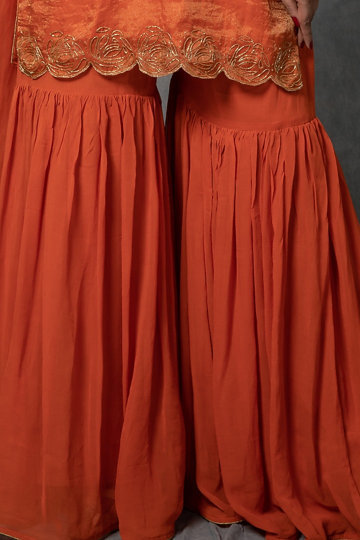 Salamander Orange Georgette Gharara Set by Farha Syed at Pernia's Pop Up Shop