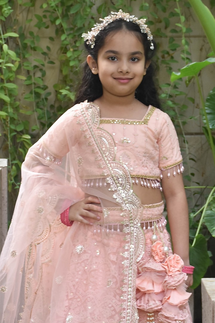 Peach Net Sequins Embroidered Lehenga Set For Girls by Fayon Kids at Pernia's Pop Up Shop