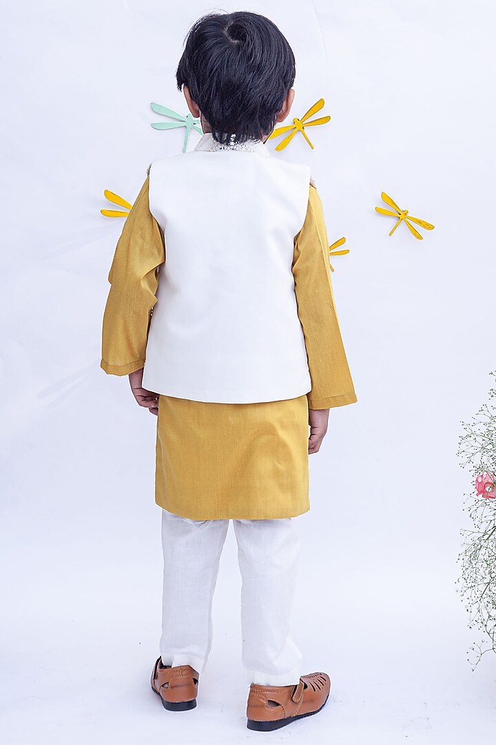Mustard Cotton Silk Embroidered Kurta Set With Nehru Jacket For Boys by Fayon Kids at Pernia's Pop Up Shop