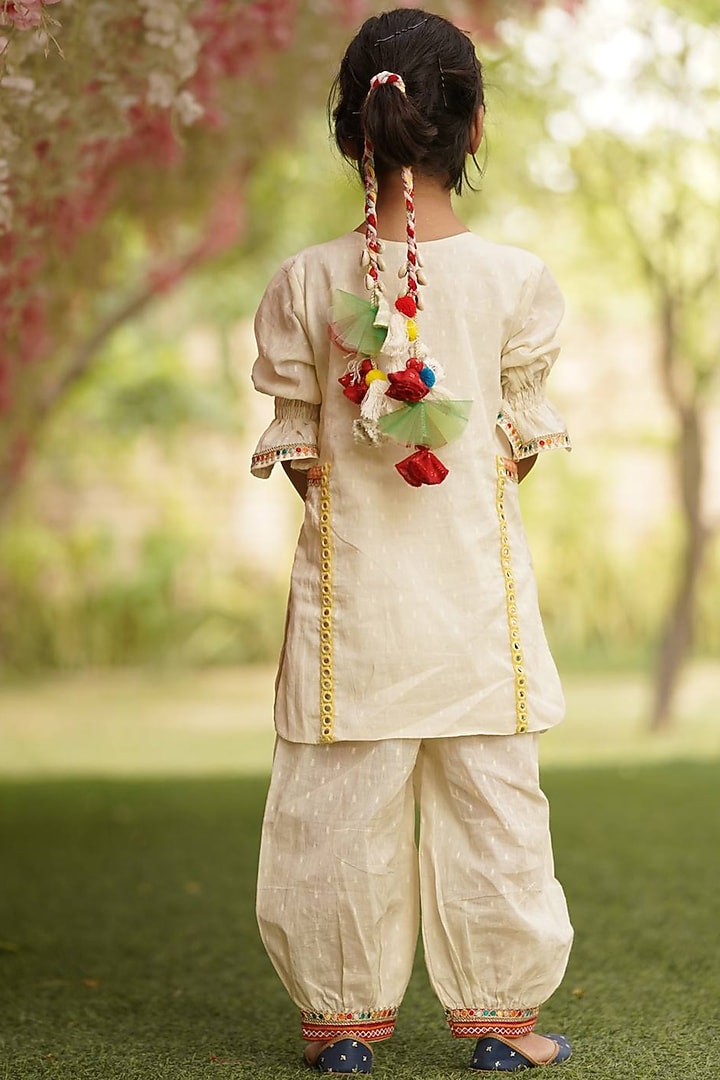 Off-White Cotton Kurta Set With Dori Tassels For Girls by Fayon Kids at Pernia's Pop Up Shop