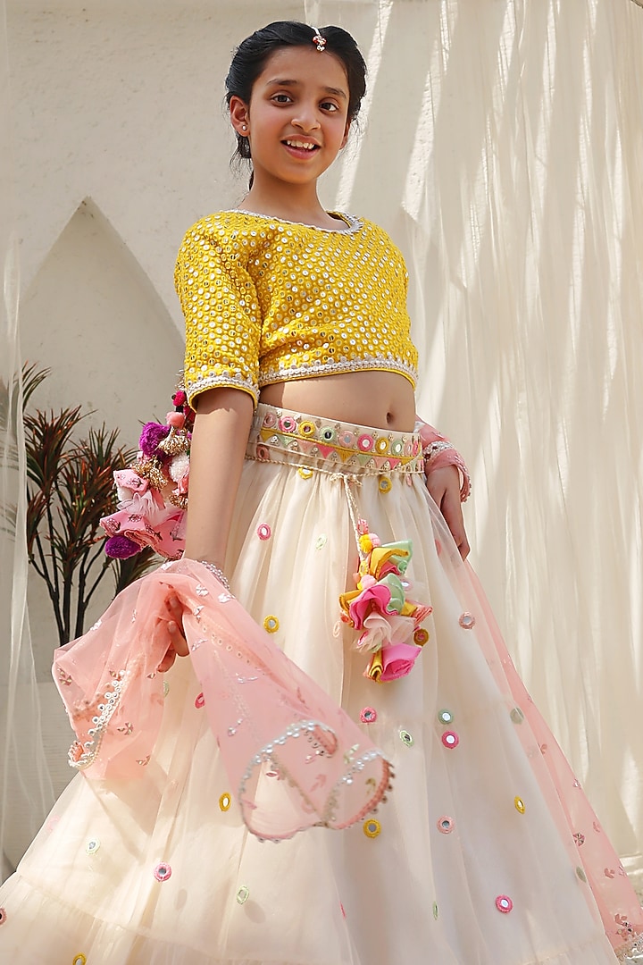 Yellow Net Embroidered Lehenga Set For Girls by Fayon Kids at Pernia's Pop Up Shop