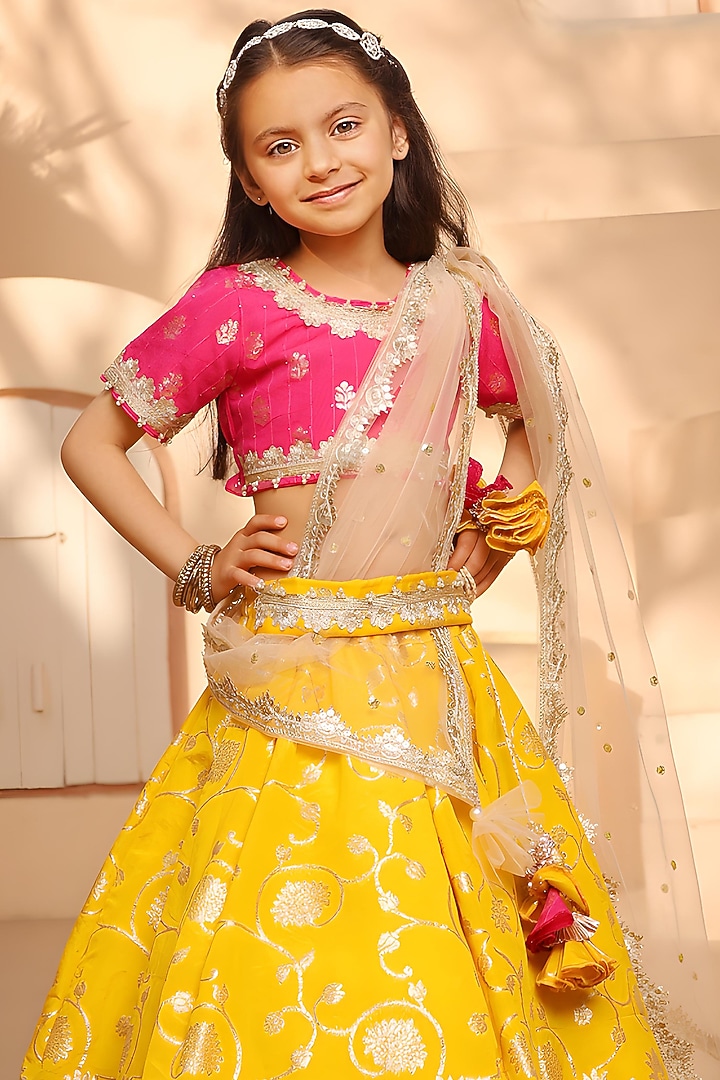 Yellow Brocade Embroidered Lehenga Set For Girls by Fayon Kids at Pernia's Pop Up Shop