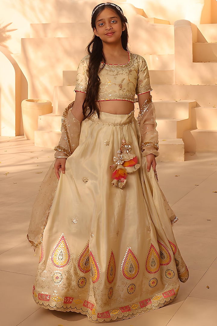 Golden Dupion Embroidered Lehenga Set For Girls by Fayon Kids at Pernia's Pop Up Shop