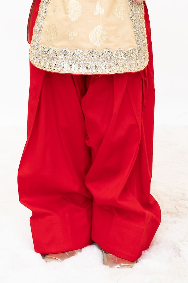 Gold Brocade Embroidered Kurta Set For Girls by Fayon Kids at Pernia's Pop Up Shop