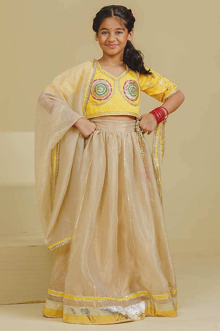 Yellow Tissue Organza Gota Lace Lehenga Set For Girls by Fayon Kids at Pernia's Pop Up Shop