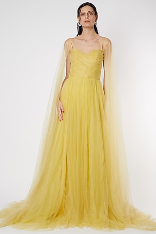 Yellow Flared Net Gown by Gauri And Nainika