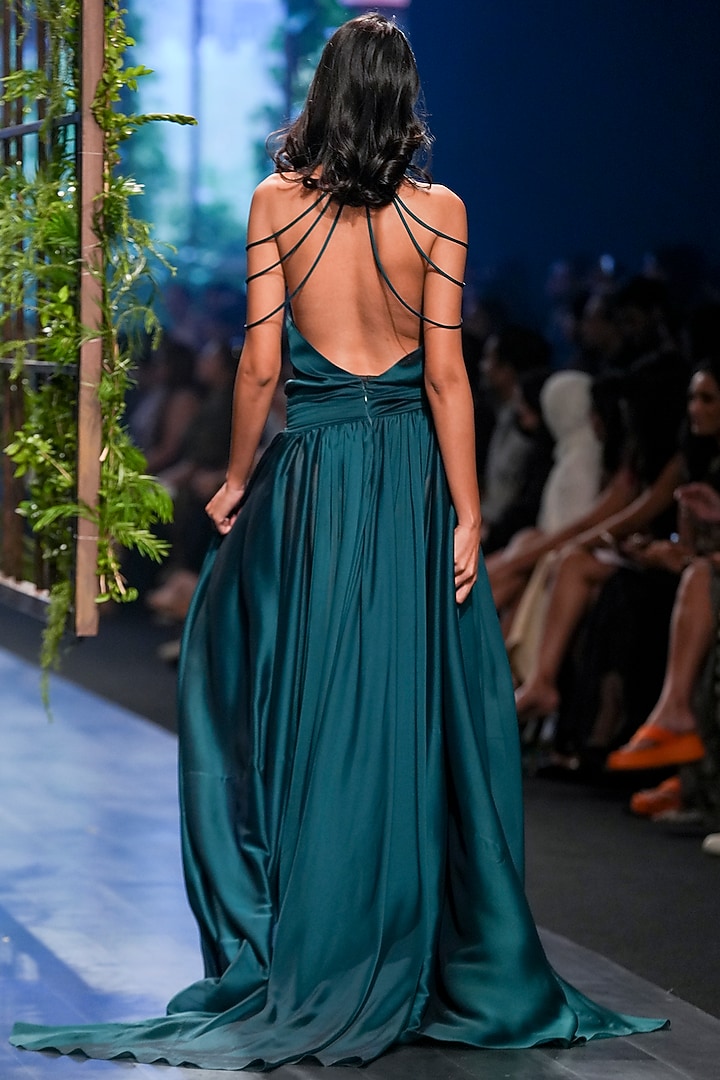 Bottle green banarsi organza metal sequence & dori embroidery top paired with cowl skirt