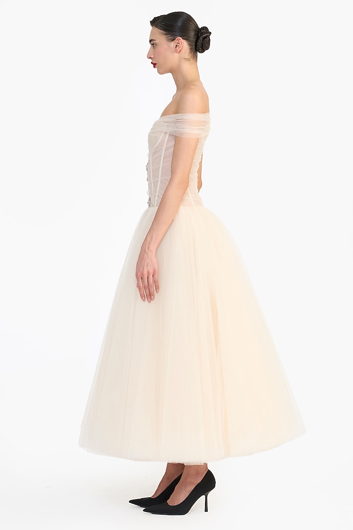 Peach Tulle Crystal Embellished Off-Shoulder Midi Party Wear Dress by Gauri And Nainika at Pernia's Pop Up Shop