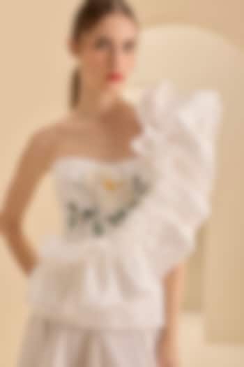 Cream Stretch Cotton Thread Embroidered One-Shoulder Ruffled Top by Gauri and Nainika at Pernia's Pop Up Shop