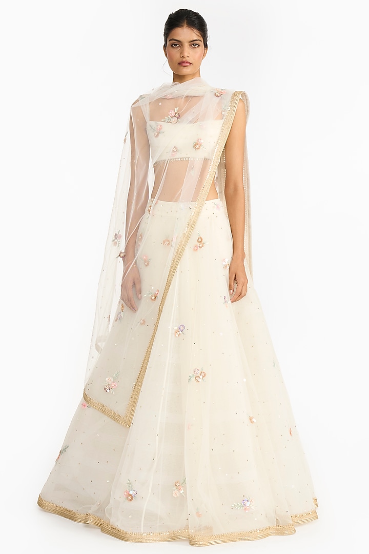 Ivory Tulle Embroidered Bridal Lehenga Set by Gauri And Nainika at Pernia's Pop Up Shop
